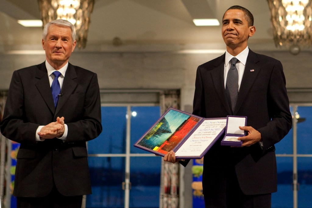 Nobel Committee Chairman Thorbjorn Jagland presents President Barack Obama with the Nobel Prize medal and diploma during the Nobel Peace Prize ceremony in Raadhuset Main Hall at Oslo City Hall in Oslo, Norway, Dec. 10, 2009. (Official White House Photo by Samantha Appleton) This official White House photograph is being made available only for publication by news organizations and/or for personal use printing by the subject(s) of the photograph. The photograph may not be manipulated in any way and may not be used in commercial or political materials, advertisements, emails, products, promotions that in any way suggests approval or endorsement of the President, the First Family, or the White House.
